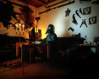 Illustration for article titled Photographs of cosplayers at home capture both the person and the mask